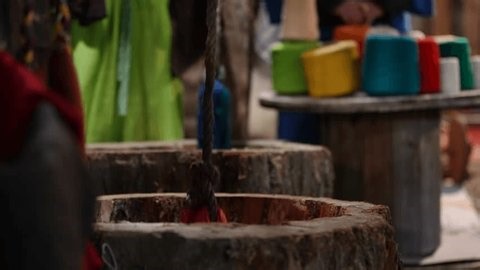 clip-3980435231-traditional-yarn-dyeing-process-textile-workshop-creating