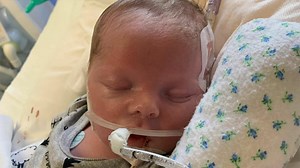 Parents say goodbye to their newborn as life support is switched off, then he does this