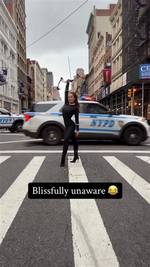 Orissa Kelly on Instagram: "Not NYPD showing up 🫢😅🏹 what a fun shoot with @reneechoiphotography !!! Thanks for braving the police with me 😂 gotta love this city #nyc #nypd #footarchery #contortion"