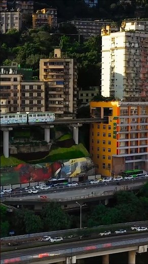Chongqing's Incredible Train Through a Building | 4K Aerial Drone View!#shorts #travel #city