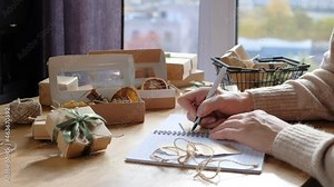 Christmas gift. gift box,zero waste, eco friendly hand made box packaging gifts in kraft paper table, eco christmas holiday concept, Christmas gift wrapping,eco decor Stock Video