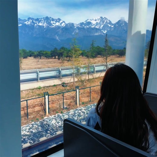 11K views · 109 reactions | Hop aboard a 35-minute scenic train ride linking Lijiang Ancient Town to Yulong Snow Mountain in Yunnan, SW China. Launched in February 2025, this new route has quickly become a must-visit for travelers eager to experience breathtaking views and unforgettable landscapes. | Xinhua Culture&Travel | Facebook