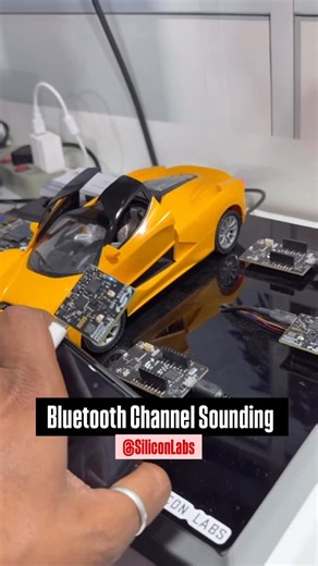 techiesms on Instagram: "Just witnessed an amazing demo of Bluetooth Channel Sounding at the @siliconlabs Labs booth during Electronica India 2025! 🚗🔓 In the demo, as I moved a BLE device closer to a toy car, its door automatically unlocked — a vivid showcase of how proximity-based triggers can power next-gen IoT applications. Bluetooth Channel Sounding, introduced in BLE 6, leverages phase and time-of-flight measurements (rather than just signal strength) to estimate distance between devices 