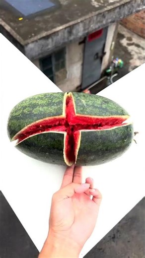 Experiment: will a watermelon explode if it rolls off a tall building? 💥🍉#shorts