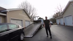 Towing Showdown: Car Owner vs. Tow Truck!