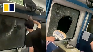 4.3M views · 15K reactions | Driven to desperation while trapped in a hot train, this man turned to smashing the window. | South China Morning Post | Facebook