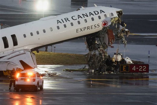 Air Canada regional jet collides with fire truck in New York's LaGuardia, killing both pilots