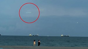 Shock video shows UFO speed through thunderstorm over beach at '2,000mph'