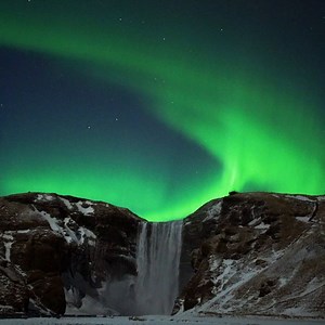 66K views · 10K reactions | A touch of Icelandic Christmas magic by Skogafoss waterfall ❄️✨ | Guide to Iceland | Facebook