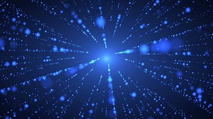 Animation of abstract glowing glitter particles with light rays. Flying bright dots, dust particles on a blue background. seamless loop