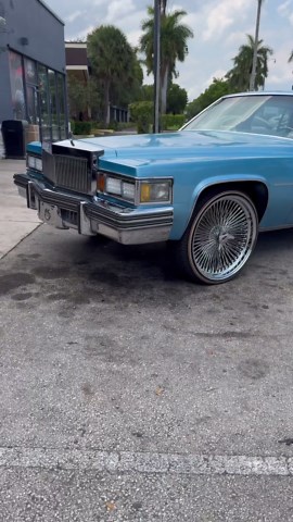 Cadillac on 24’s chrome Daytons