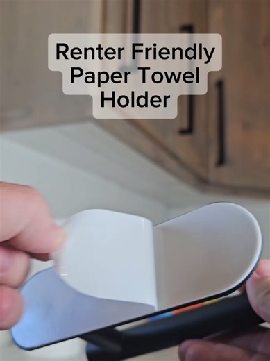Under-cabinet stick-on paper towel holders are a renter-friendly way to save counter space without drilling holes or damaging cabinets. These adhesive mounts use strong, damage-free tape (like 3M) that holds your paper towels securely and peels off cleanly when you move out. They fit easily under upper cabinets, inside cabinets, or on pantry shelves, keeping towels within reach yet out of sight. Installation takes just minutes and doesn’t require tools, screws, or hardware. Many designs swivel o