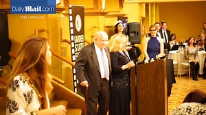 Ed Asner cops a cheeky feel of Sally Struthers' behind