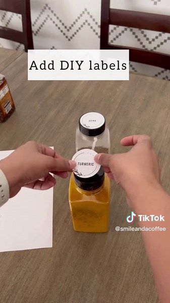 Easy and inexpensive spice cabinet organization using salt containers and DIY labels. #spicerack #spices #spicecabinetorganziation #indianspices #pantryorganizationideas #kitchenorganizing