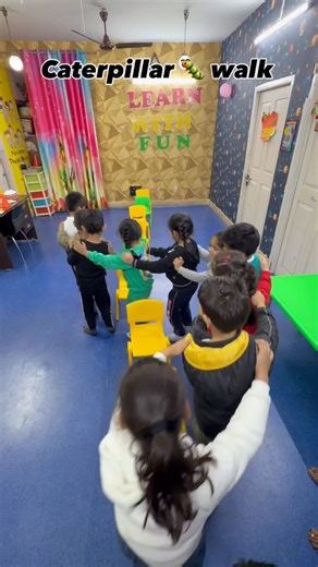 LEARN WITH FUN on Instagram: "🐛 Caterpillar Walk 🐛 A fun group activity that teaches children how to move together as one team. ✨ Builds group bonding ✨ Improves coordination & balance ✨ Encourages teamwork & listening skills ✨ Makes learning joyful through movement #CaterpillarWalk #GroupActivityForKids #TeamworkSkills #SocialSkillsDevelopment #LearnThroughPlay KidsMovement GroupBonding EarlyLearning FunWithFriends ActiveKids"