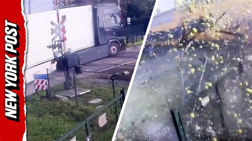Dutch train smashes through fruit truck sending produce flying
