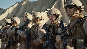 clip-20883199-group-fully-equipped-soldiers-standing-line-desert