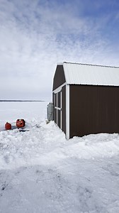 Our ice houses include heat, lights, and holes drilled with zero hassle, all fun. This house is our 8-person sleeper. | Acorn Hill Resort