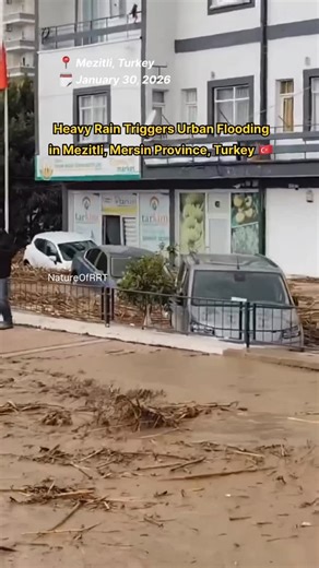 Nature Of RRT on Instagram: "Heavy Rain Triggers Urban Flooding in Mezitli, Mersin Province | January 2026 Severe rainfall overnight led to flash flooding in Mezitli, located in Mersin Province, southern Turkey, on January 30, 2026. Rapid water accumulation caused local creeks to overflow, resulting in waterlogging across residential streets, commercial areas, and key roadways. Several parked vehicles and ground-level properties were affected, while traffic movement was temporarily disrupted. Mu