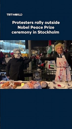Protesters rally outside Nobel Peace Prize ceremony in Stockholm