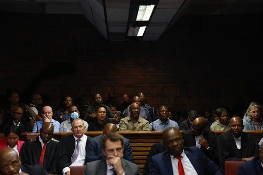 South Africa’s top police officer faces charges in a widening corruption scandal