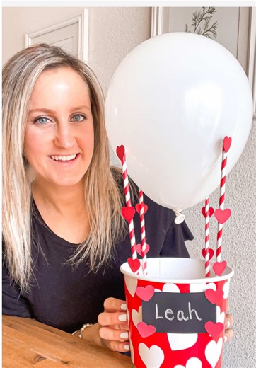 HOT AIR BALLOON VALENTINE BOX 💗 Supplies: • 1 Basket or Box • 1 Balloon • 4 Straws • Heart Shaped Paper Cutouts • Black Construction Paper • Silver Sharpie • Glue Gun Watch the video to see how I made it! #valentinesdaybox #valentinesdayideas #valentinesdaycraft #vday #valentinecraft