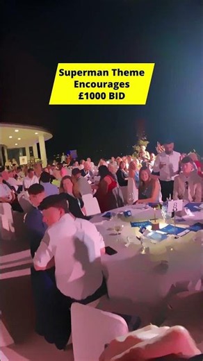 Gala Dinner Auctioneer Sings Superman Theme for £1,000 Bid!