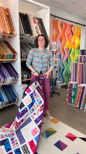 My latest finish! Pattern is The Penny Quilt from Kitchen Table Quilting. The fabrics are Hello Alice from Ruby Star Society. The quilting was done by me with the moonflower panto. and the backing fabric is from Anna Maria textiles, a 108 wide called jumpstart in plum. You can find the pattern, the backing fabric and some of the Hello Alice line in my shop . #pennyquilt #rubystar #rubystarsociety #moonflowerpanto #annamariatextiles | purplebobbin