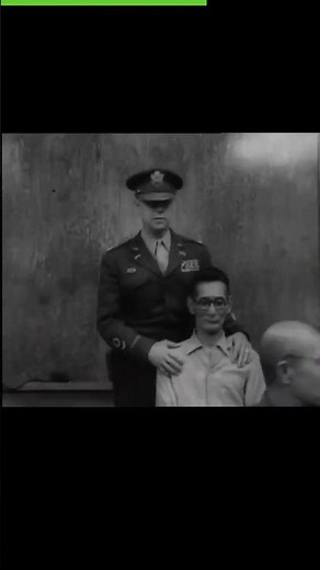 (1946 )Hideki Tojo slapped on the back of his bald head during 1946 Tokyo war crimes tribunal