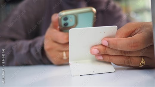 Person using phone while scan the QR code to find the menu