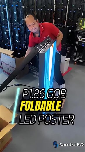 Why choose the folding design of the LED poster screen? 1. **Portability & Flexibility**: The compact, foldable design makes it easy to carry and transport. It can be quickly adjusted to different sizes for various display needs. 2. **Space - efficiency**: When folded, it saves storage space. It can be adapted to limited spaces and adjusted for optimal display results. 3. **Easy Installation**: The unique structure allows for quick setup and disassembly without special tools or skills, saving ti