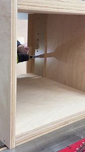 Adding adjustable shelf pin holes to the open shelf base cabinet. #woodwork #cabinet #carpentry #woodworking #cabinets | Wildman Design Co.