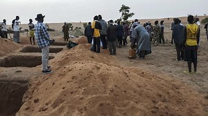 Mali’s government sharply lowers death toll in village massacre