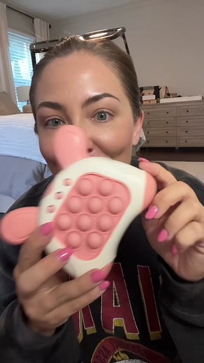 This fast push pop up game is such a hit with all ages! Stocking stuffer idea, perfect for long car rides, etc. The sound can be turned down or off and it has 4 ways to play including multiplayer. A fun secret santa or white elephant gift idea too! #fastpush #fastpushgame pop it game, games for kids #stockingstuffers #tiktokshop #tiktoktoy