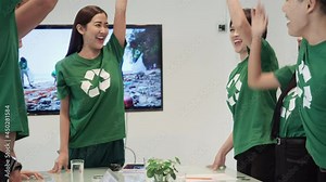 Volunteer team meeting and presentation of working together. Volunteer man and woman brainstorm ideas resolve about waste beach. Team campaigners collaborating work for next summer.