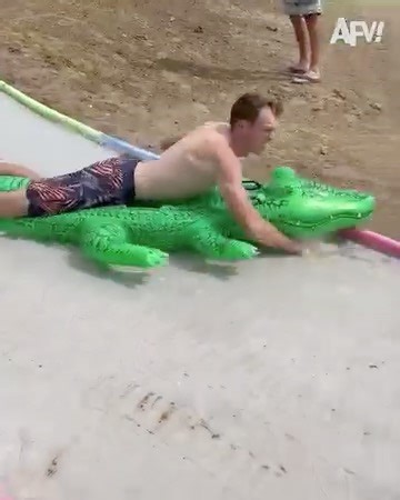 Who hasn't embarrassed themselves on a slip-and-slide? 😂 | America's Funniest Home Videos