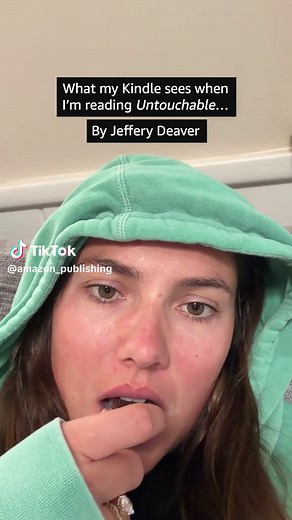 Reading Untouchable by Jeffery Deaver on Kindle