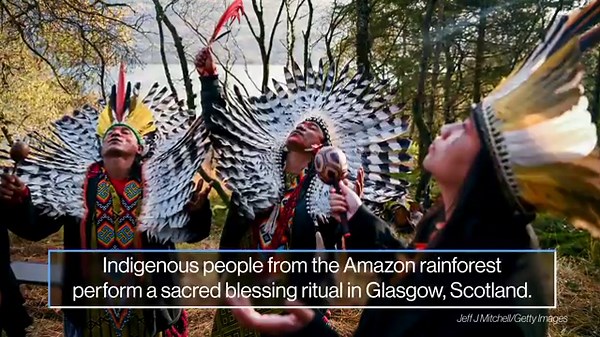 Astroworld victims remembered, US opens to travelers, COP26: World in Photos, Nov. 8