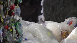 Waste sorting. Plastic waste, trash - PET bottle recycling - reduce reuse recycle. Workers sorting garbage, waste to be processed in a recycling plant. Enviroment protection concept. Recycling garbage Stock Video