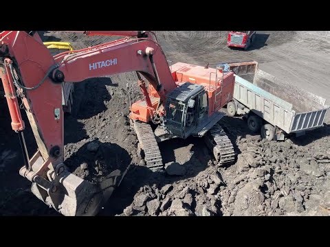 Hitachi Zaxis 670LCR Excavator Loading Mercedes & MAN Trucks