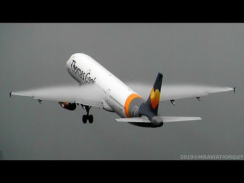 AMAZING Plane Wing CONDENSATION CLOUDS & Wake Turbulence CLOUD CUTTING! (Thomas Cook A321 Takeoff)