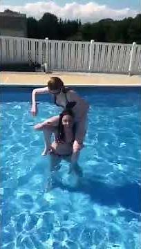 Piggy Back Riding in the Pool