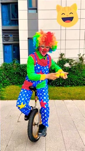 There's a clown riding a bicycle 😂