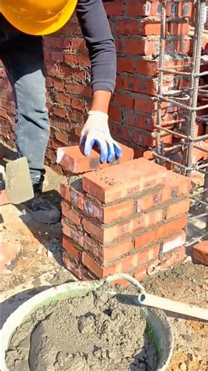 Constructing a Durable Brick Pillar Using Traditional Masonry Techniques and Red Bricks