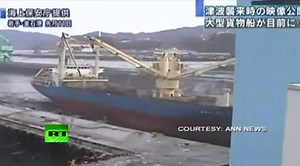 Video of Japan tsunami ravaging through port full of ships