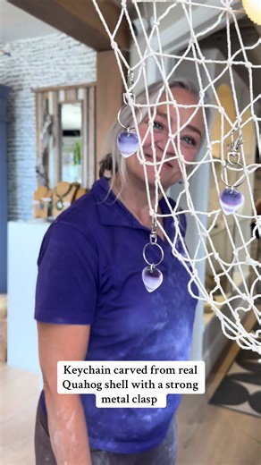 This keychain is made from natural Quahog shell, so it’s durable but should be handled carefully. With everyday use, the metal clasp may show wear over time, but the carved shell itself will stay strong for years if you avoid dropping it on hard surfaces.