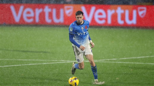 Stockport vs Wigan suspended as Vertu Trophy clash battered by torrential rain