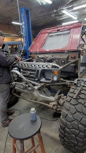 Today, I used my harbor freight bench top lathe to make radiator mounts! Learning basic machining has been pretty rad. I used a special bit to make a center mark in the 3/4 bar stock. Then I drilled it 1 1/2" deep and tapped the hole 1/4 × 20. I even machined a little shoulder at the top to keep the peice from falling all the way through the crossmember while I welded. After giving it a low build tig weld, the radiator is officially mounted 🤘. I'm starting to get a bunch of ideas of how this to