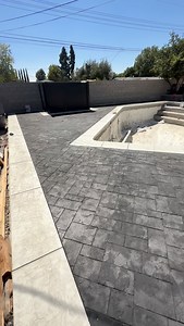 From pour to stamp to perfection. White concrete coping with slate texture built to stand out. Trust the process. . . . . #landscape #banueloslandscaping #viral #trending #explorepage | Angel Banuelos