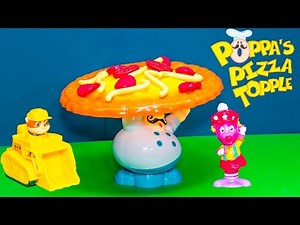 Playing the Poppa Pizza Topple Game with Paw Patrol vs Backyardigans